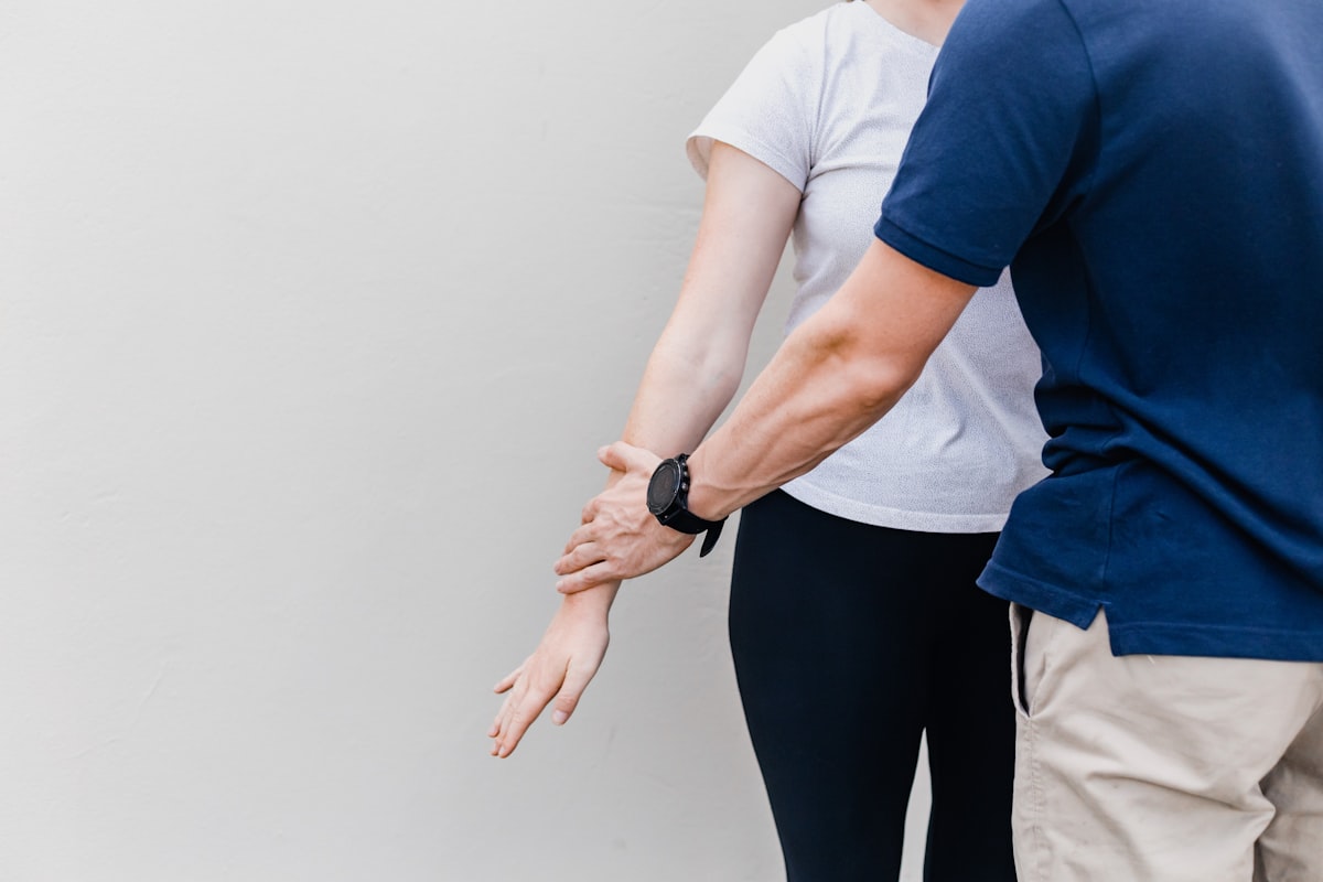 Person performing controlled stretching and movement therapy